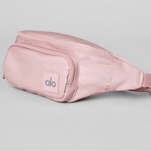 NWOT ALO Yoga Light Pink Belt Bag- plastic on zipper pulls & adjustable piece.